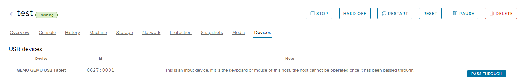 The device list of a VM with a USB device and the warning that passing an input device through takes the host's own keyboard away